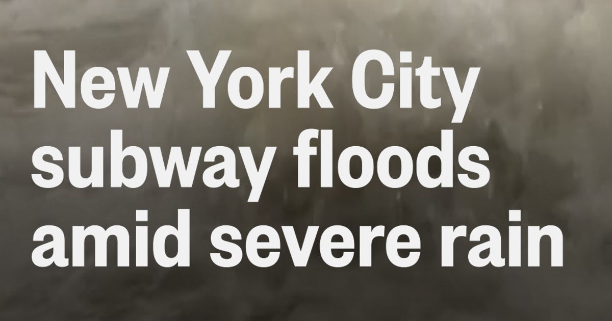 Floodwater gushes into New York city subway station