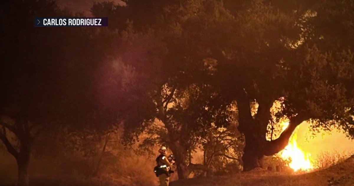 New wildfire prompts evacuations in Los Angeles as dozens rage out west