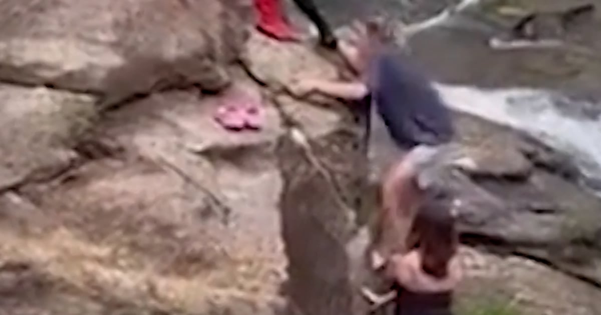 Local Spider-Man rescues couple stuck on waterfall