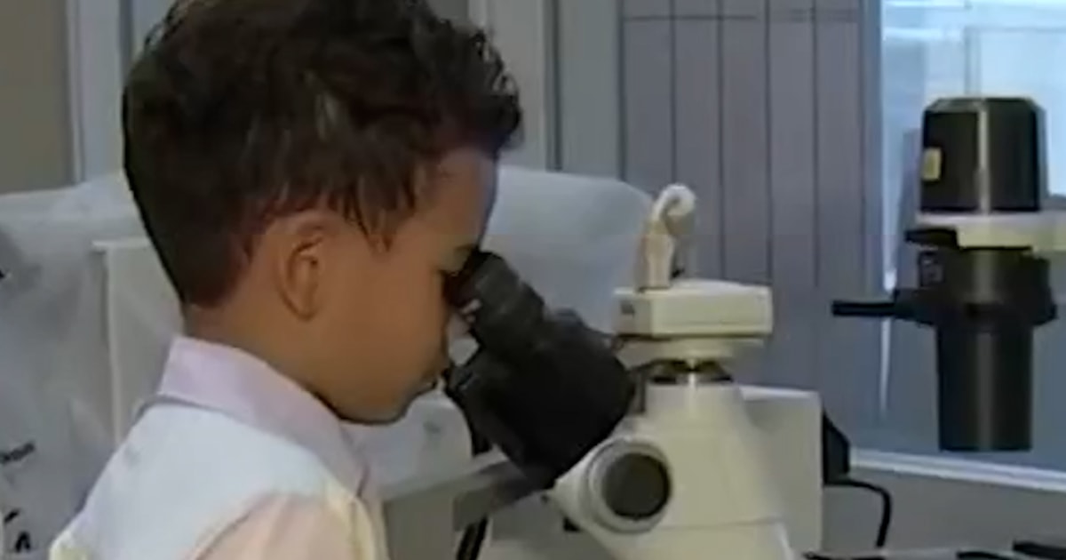 Nine-year-old boy attends first day of college