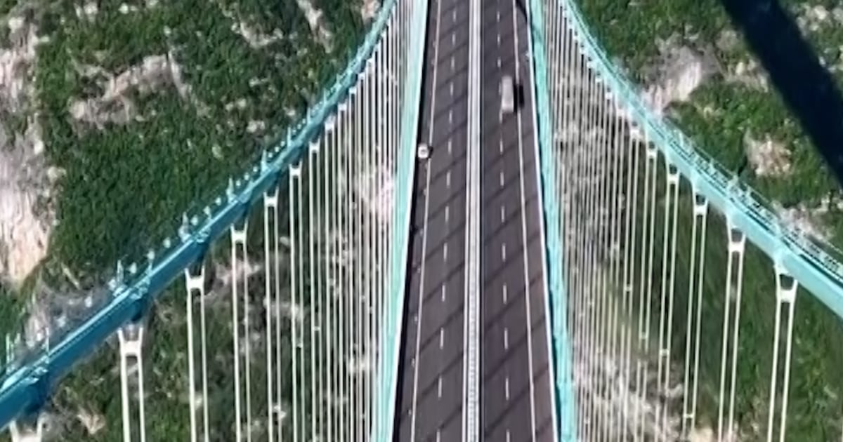 World’s tallest bridge opens to visitors in China