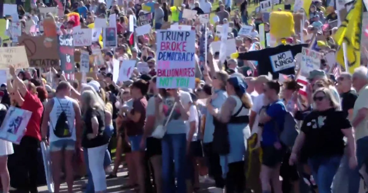Huge crowds take to streets to protest Trump administration