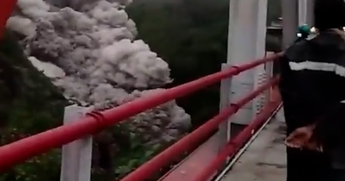 Indonesia volcano erupts sending people running