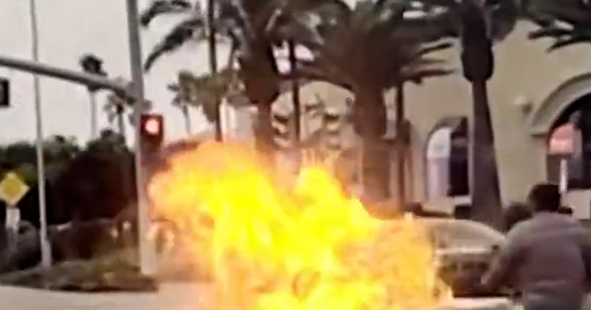 Dirt Bike Erupts In Flames On Camera After Hitting Car