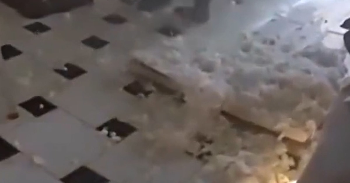 Suspect crashes via ceiling onto ready SWAT crew