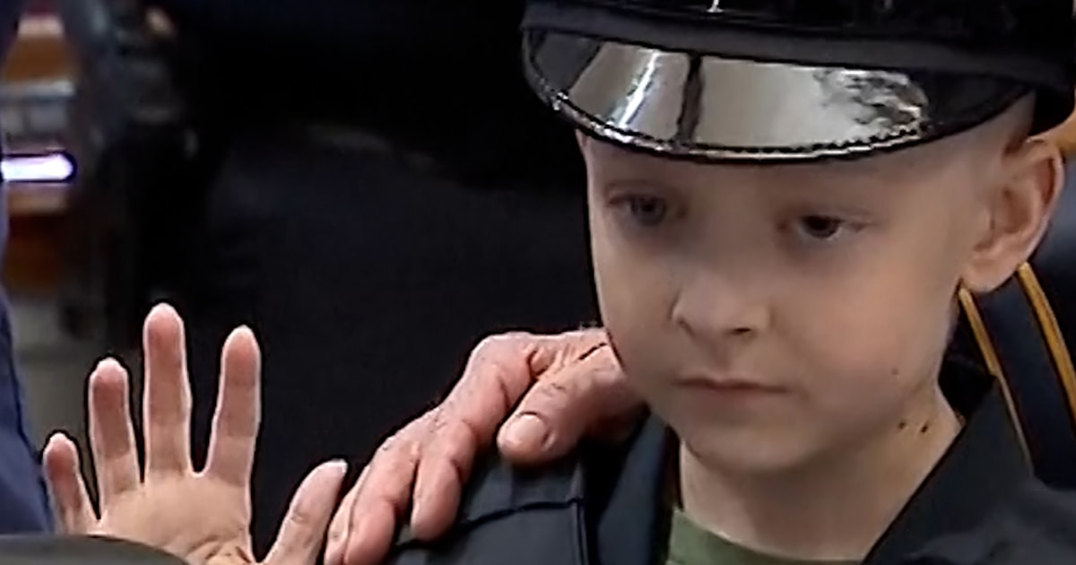 Boy fighting cancer sworn in as police chief for a day