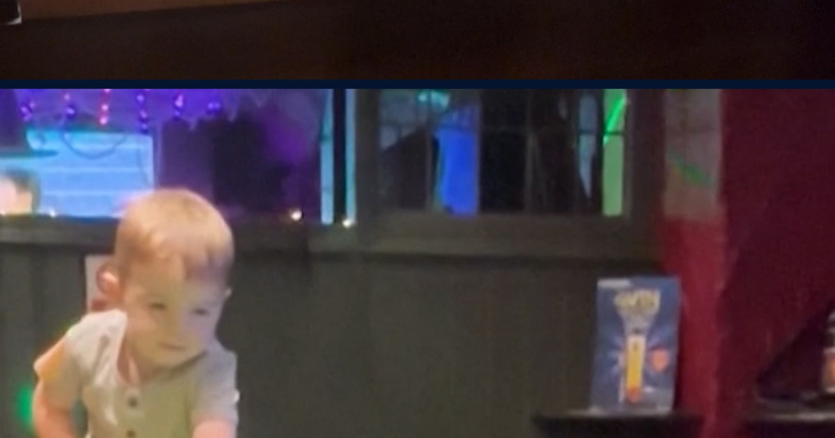 Two-year-old pool player breaks trick shot world record