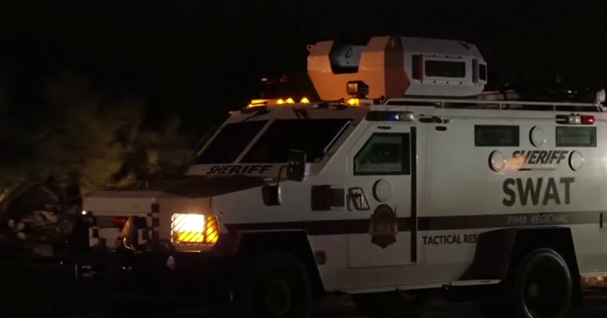 Law enforcement activity happening in Nancy Guthrie's neighborhood