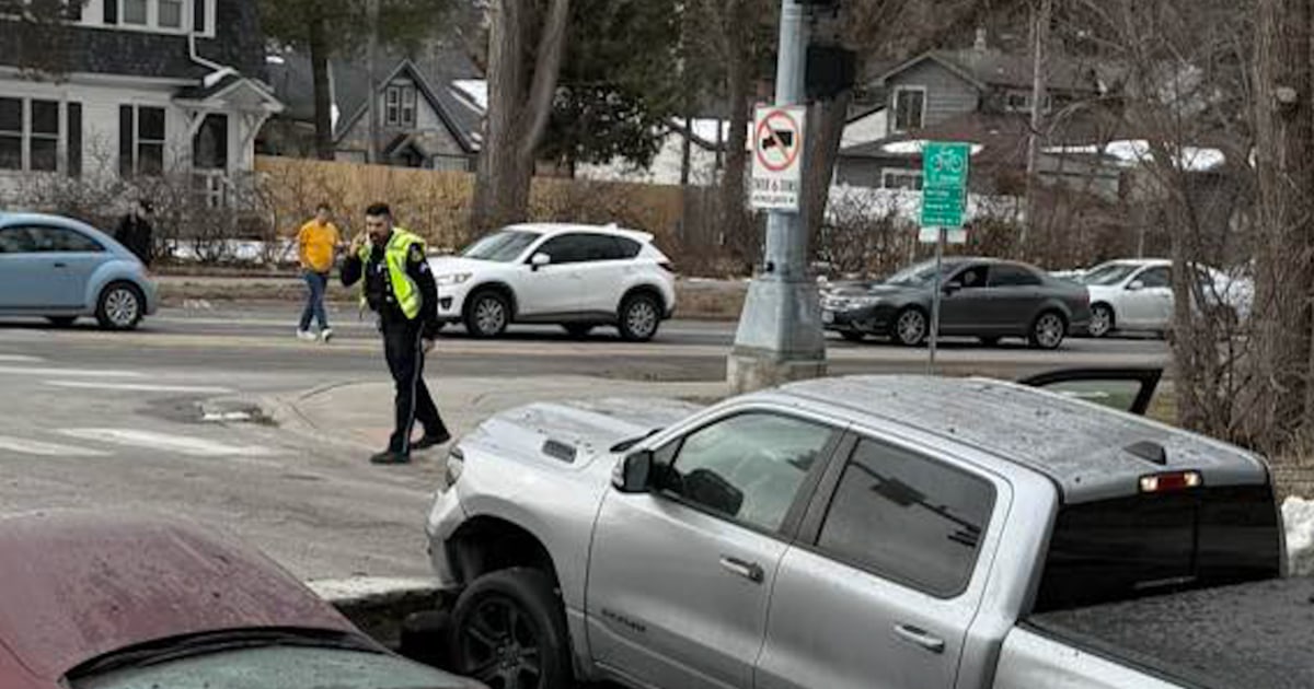 Sinkhole swallows up cars at Nebraska intersection