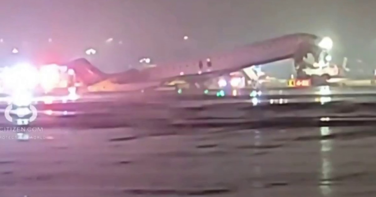 At least four injured in collision between plane and vehicle at NYC LaGuardia Airport