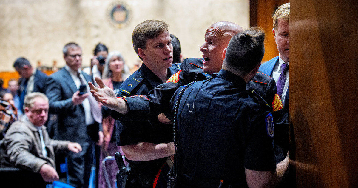 Article image for: Marine veteran has arm broken during protest against war in Iran