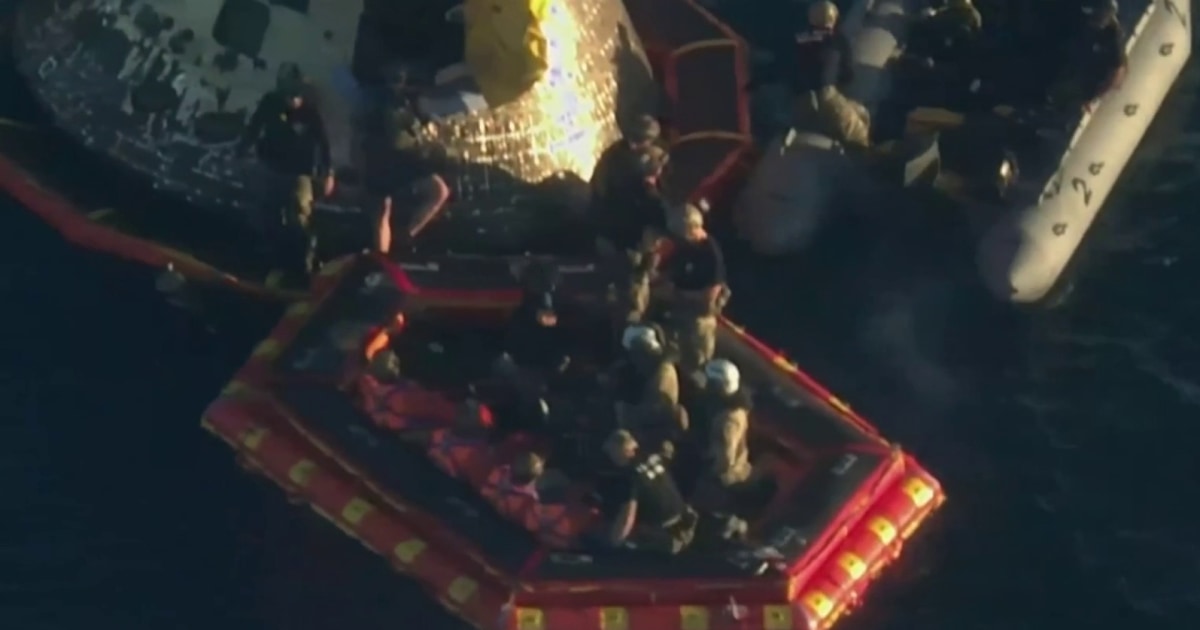 Astronauts safely removed from Orion capsule