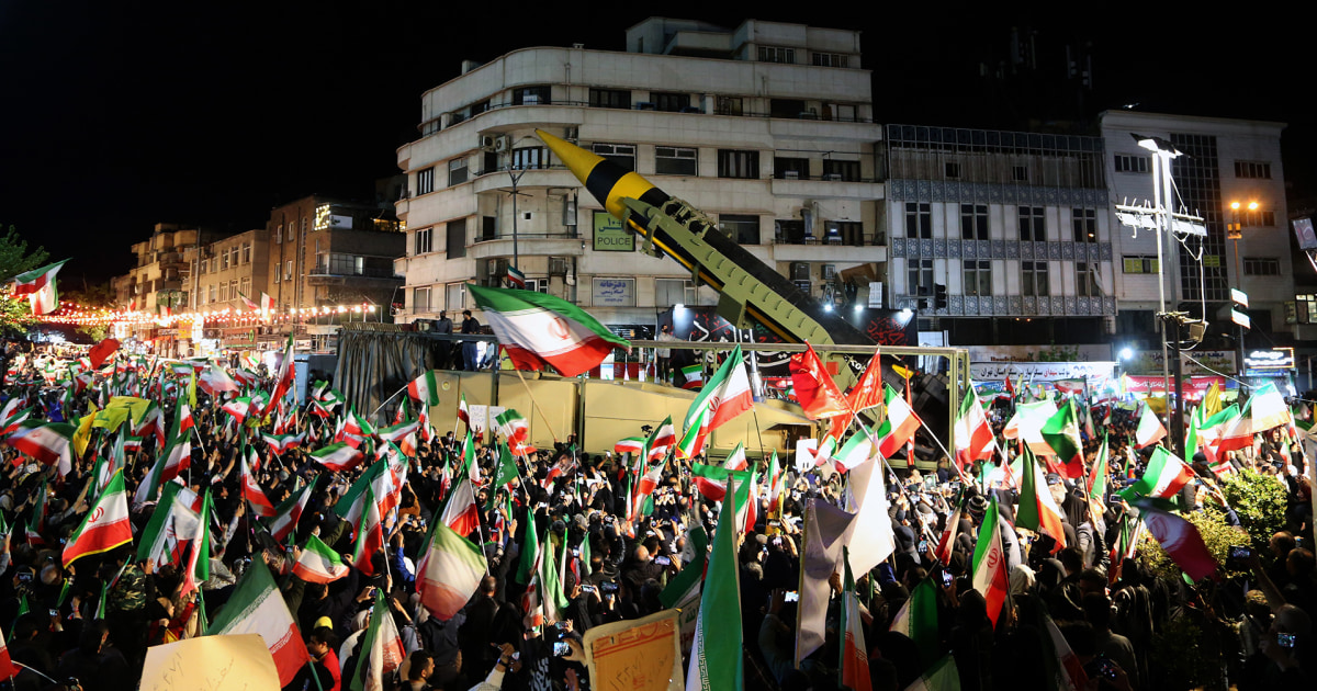 Iran displays apparent ballistic missile at Tehran rally