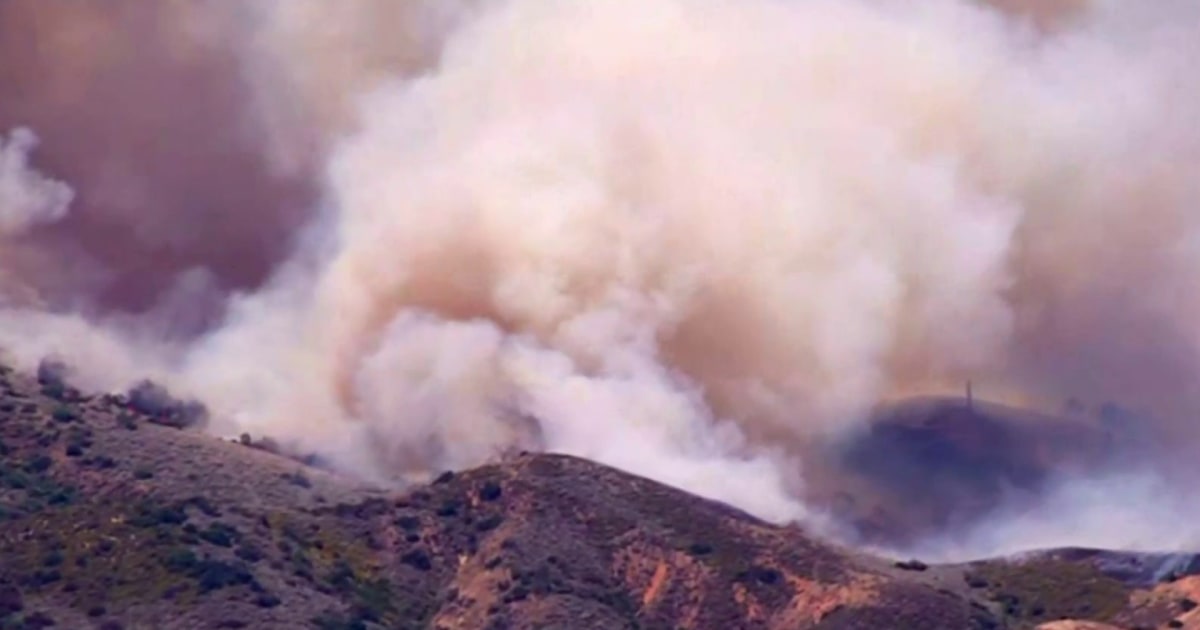 Massive wildfires tear across Western U.S.