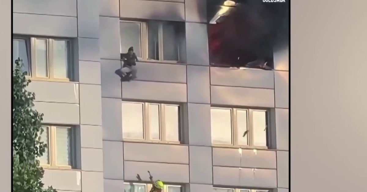 Woman jumps to escape Berlin high-rise fire