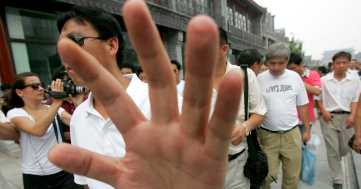 Beijing detains more Chinese, U.S. protesters
