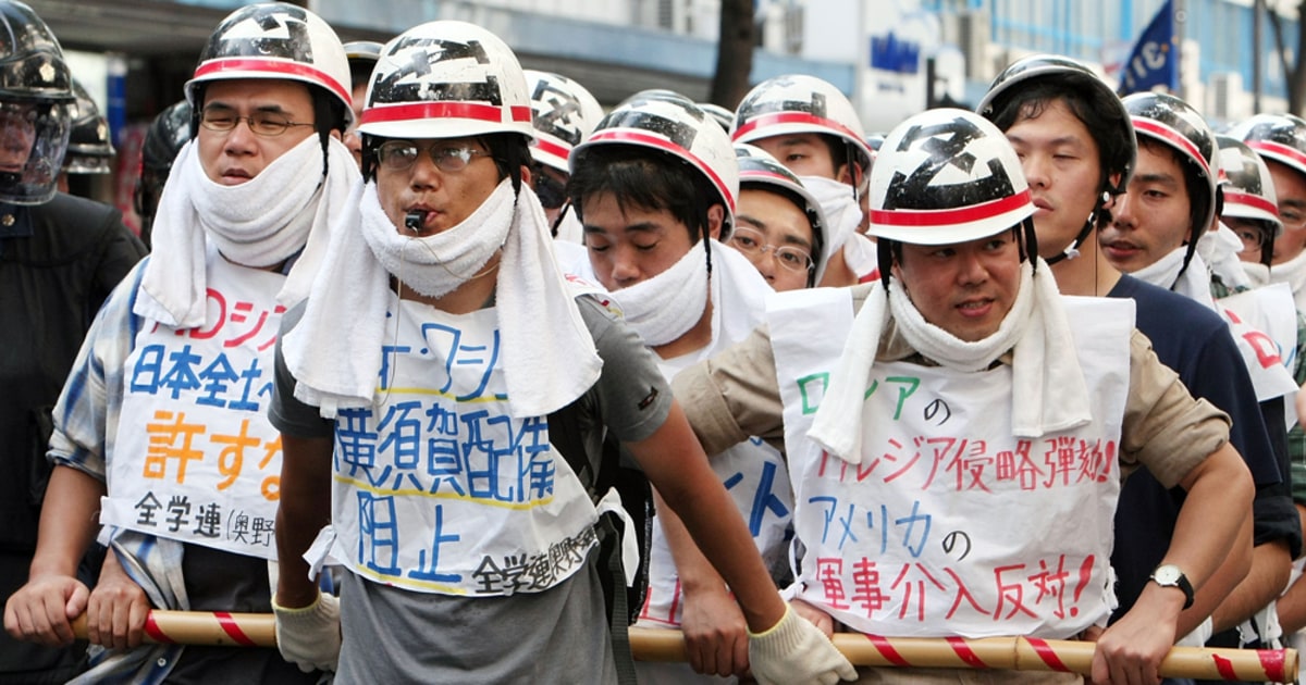 Japan Protes Protests as U.S. ship docks at new Japan home