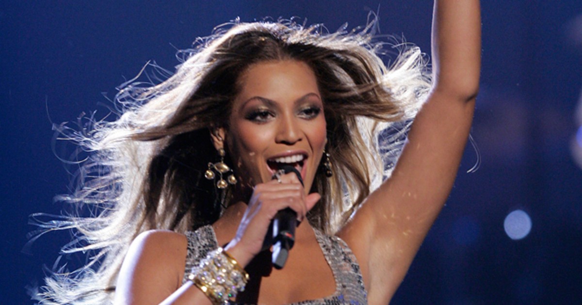 Album sales continue fall, downloads climb