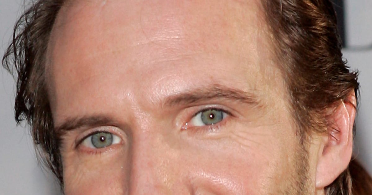 Flight attendant axed for alleged Fiennes fling