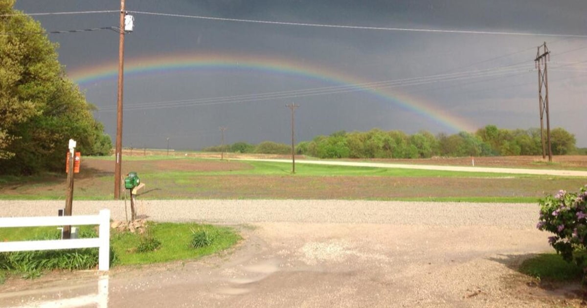 Rainbow Forms Near Looming Funnel Cloud in Iowa