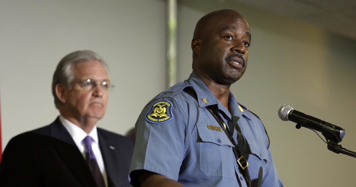 Michael Brown Rally: Ferguson Marchers Hug Highway Patrol Capt.