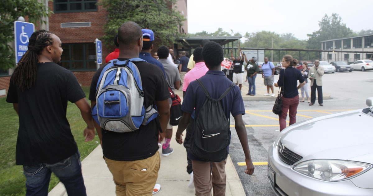 Michael Brown S Former High School Resumes Classes Amid Ferguson Chaos