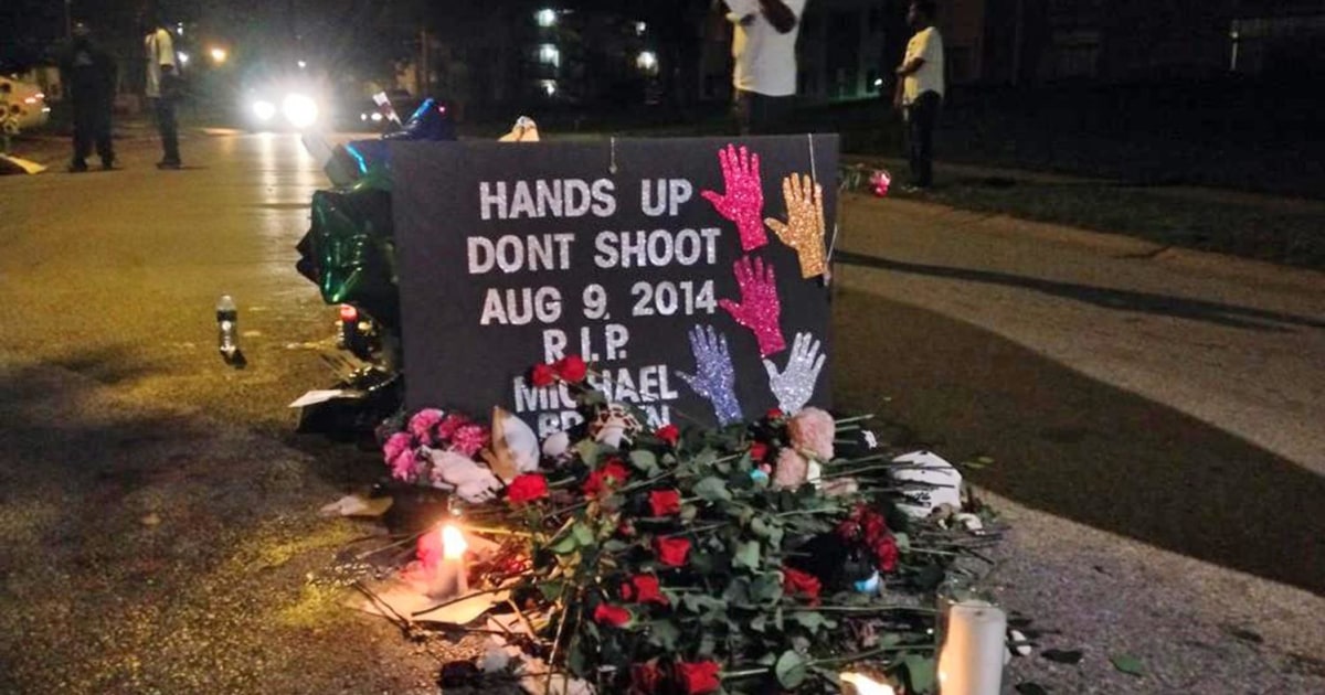 Roses Line Scene of Michael Brown Shooting in Ferguson, Missouri