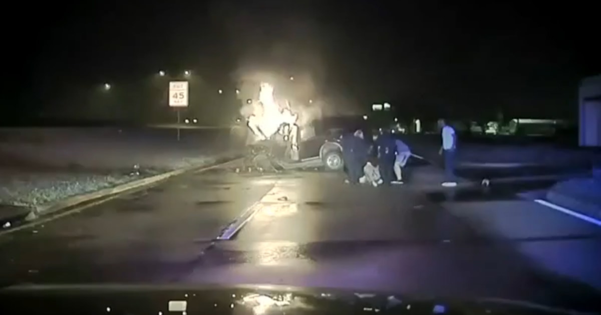 Watch Heroic Cops, Good Samaritan Pull Man from Burning Car