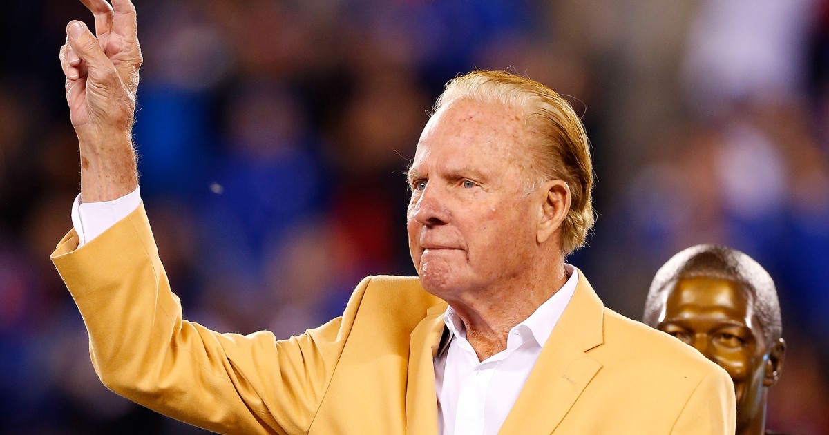 Frank Gifford of the New York Giants runs on to the field during an News  Photo - Getty Images