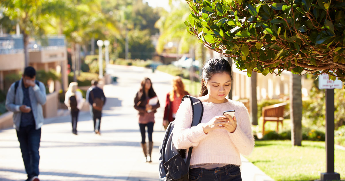 Student Getting Text Message Concern College Students Now Receiving Text Message Reminders to Show Up