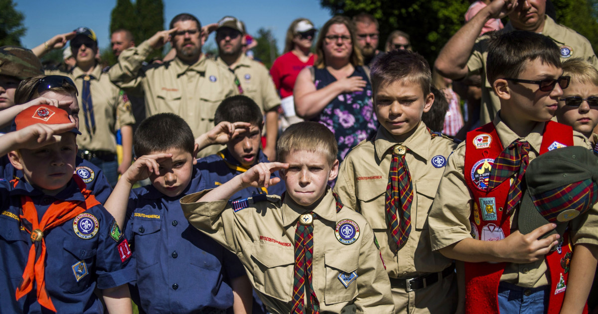 The Boy Scouts say they will now admit girls. Here's what that means.