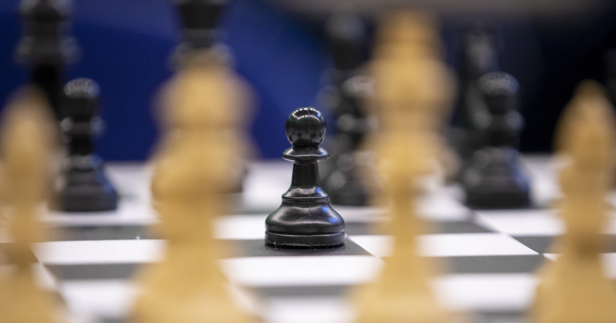 Local chess player takes his game international