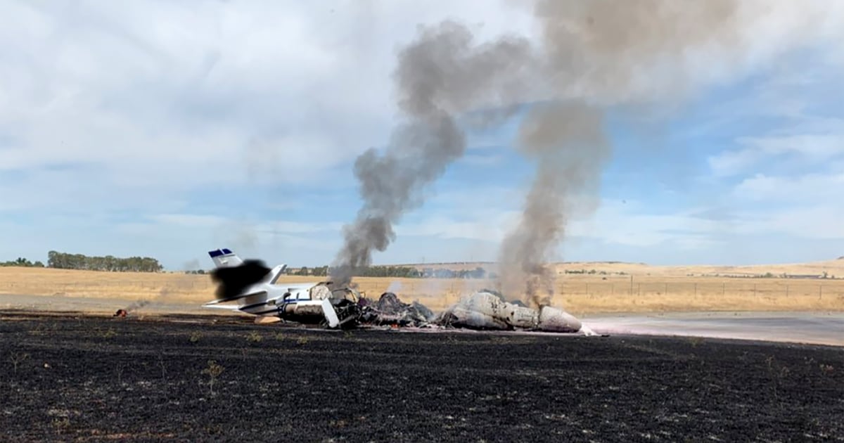 Passengers walk away uninjured after plane bursts into flames at
