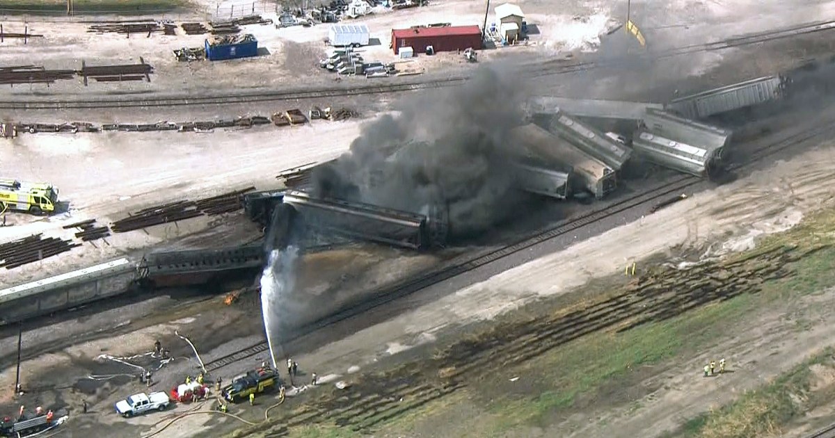 Train derails and catches fire in Illinois, triggering evacuations as