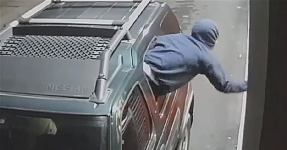 Gunman climbs into McDonald's through drivethru window, video shows