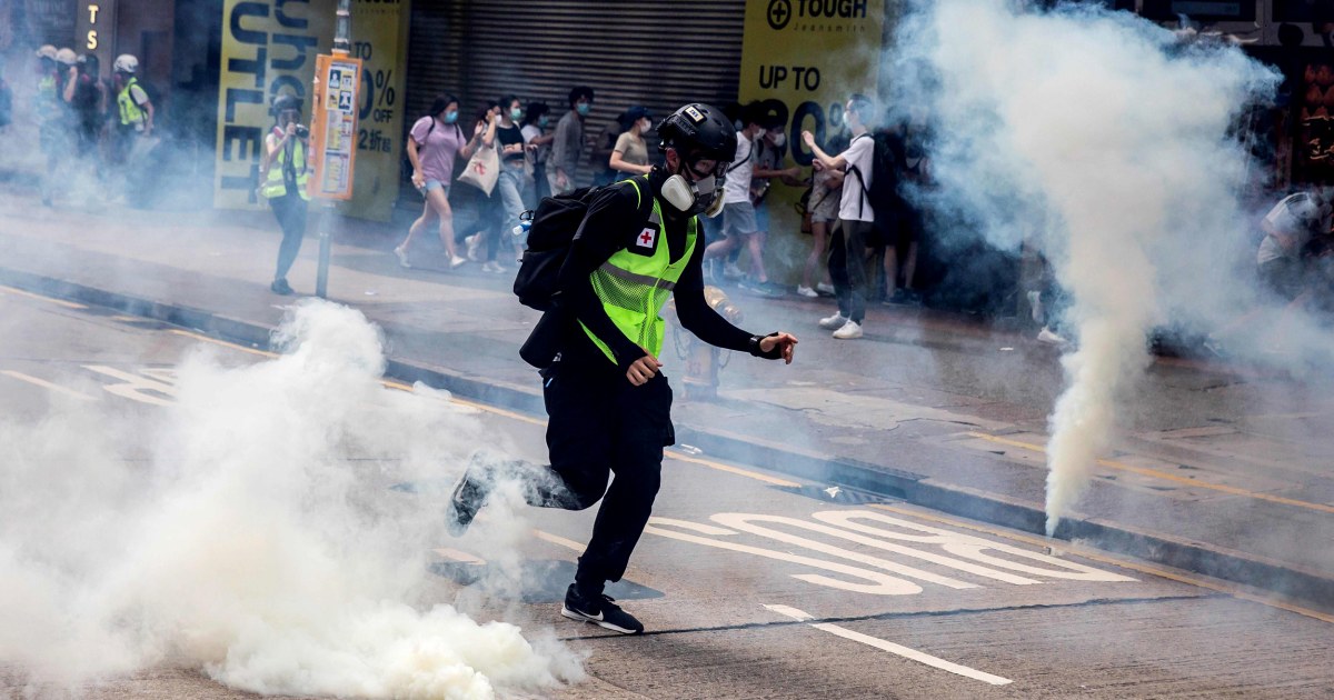 Hong Kong police fire tear gas, water cannons at protest against ...