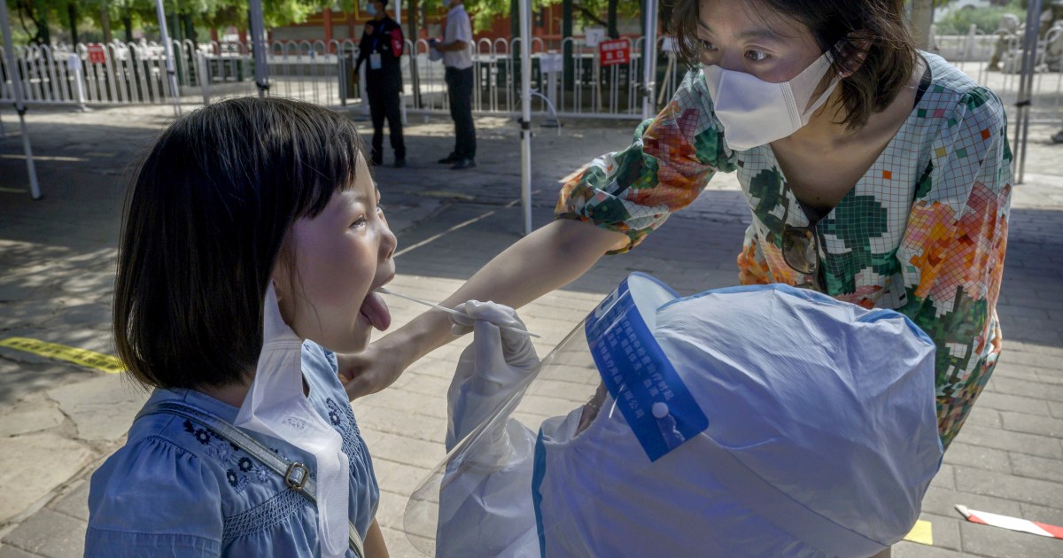China declares new outbreak contained after massive testing effort