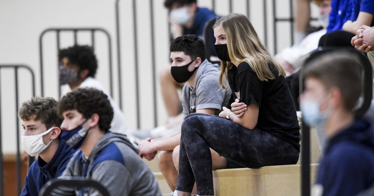 Teachers join front-line workers concerned over new CDC mask guidance