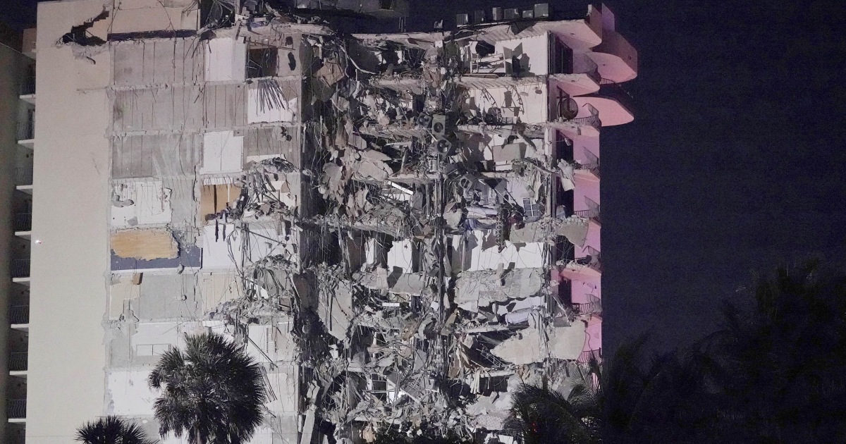 At least 1 dead after multi-story building partially collapses in ...