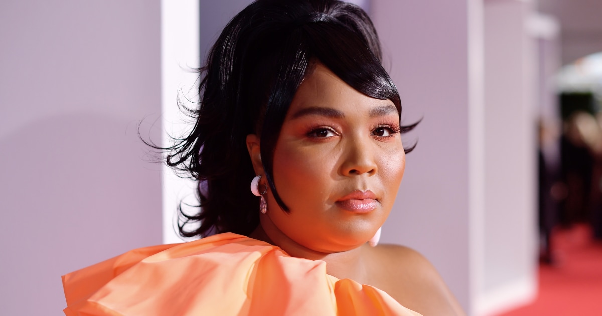 Lizzo tearfully calls out 'fatphobic' and 'racist' hate following 'Rumors'  release