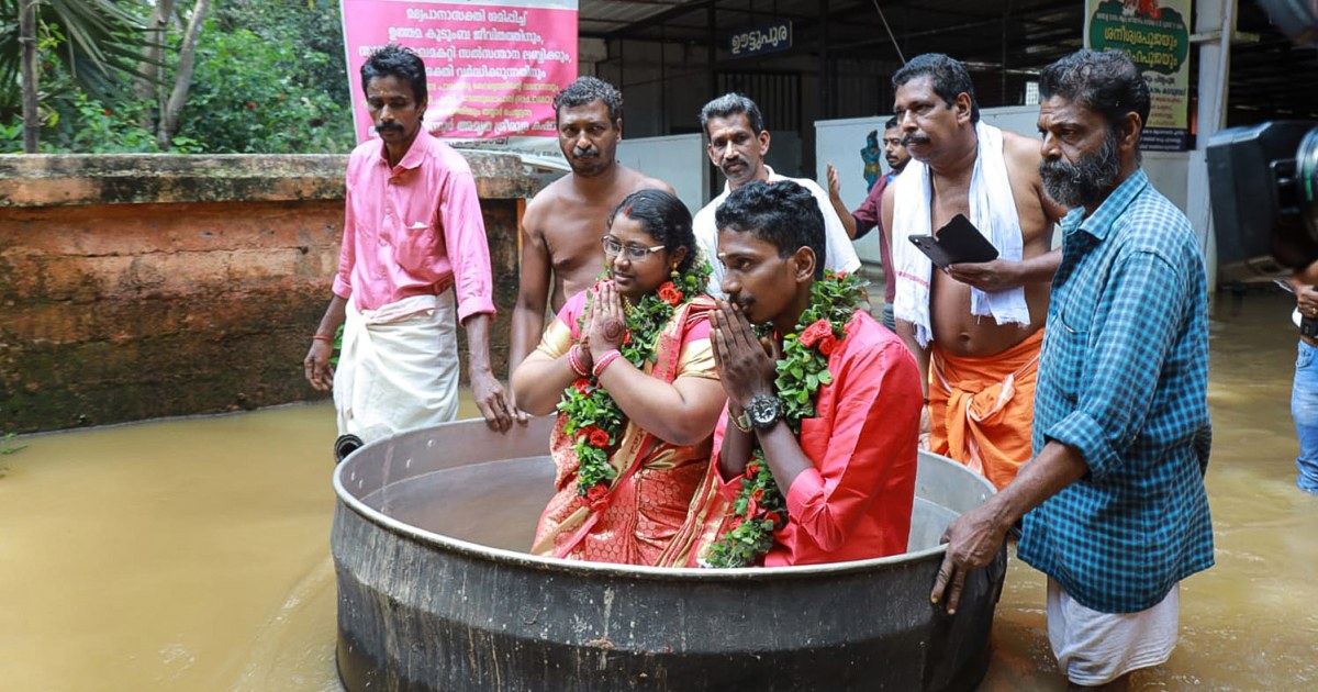 In flood-hit Kerala, India, couple floats to wedding in giant pot