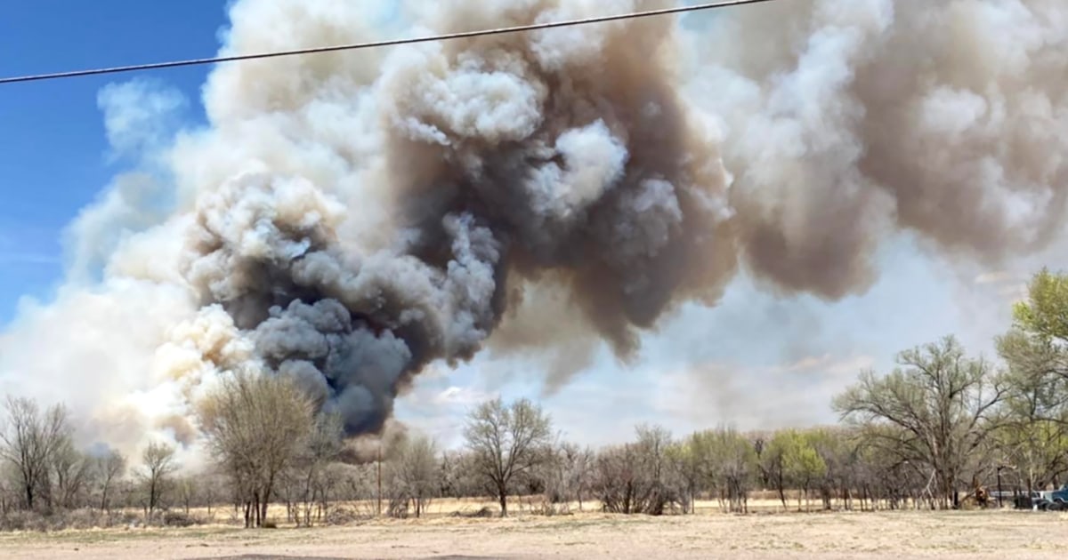 Fast-moving New Mexico wildfires burn more than 100 structures, thousands of acres