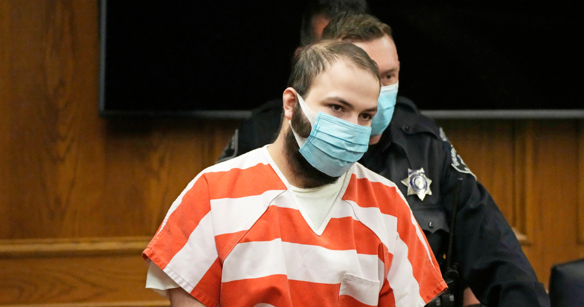 Colorado shooting suspect can’t afford to appear in court, hearing rules