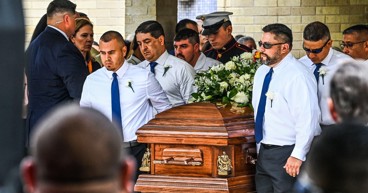 Mourners lean on faith as teacher and her husband are laid to rest in Uvalde