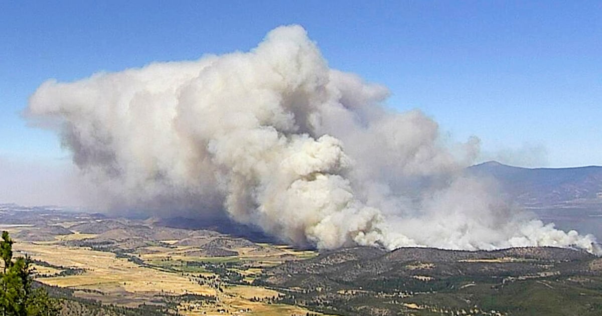 Rapidly spreading fire in Northern California prompts evacuations as heat wave grips the state