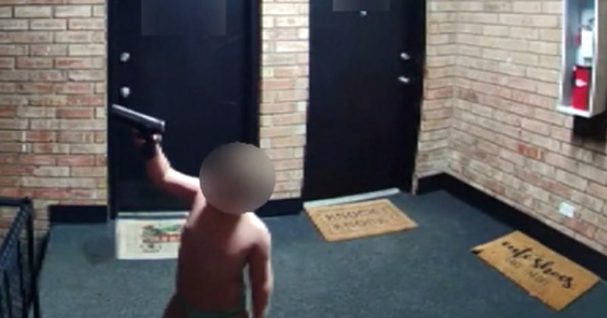 #Man is arrested on live TV after his toddler son is seen roaming a hallway with a gun