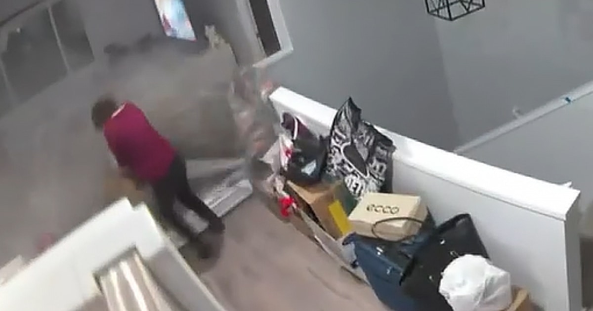 Video shows terrifying moment boulder crashes into Honolulu home and nearly strikes woman