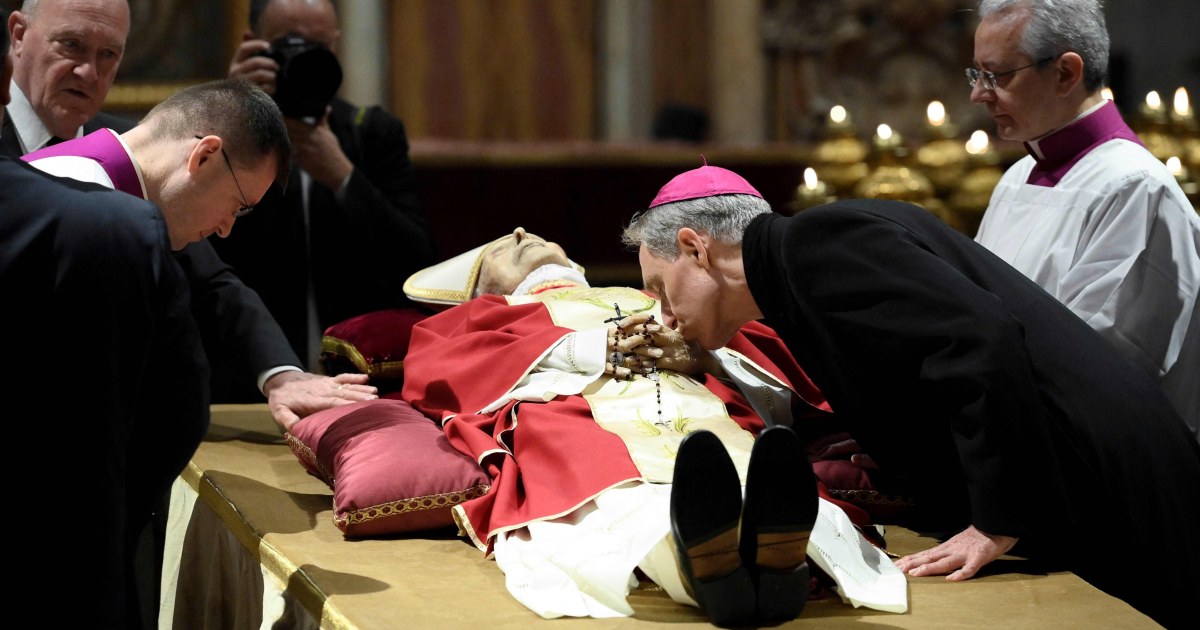Thousands pay homage as Pope Emeritus Benedict XVI lies in state