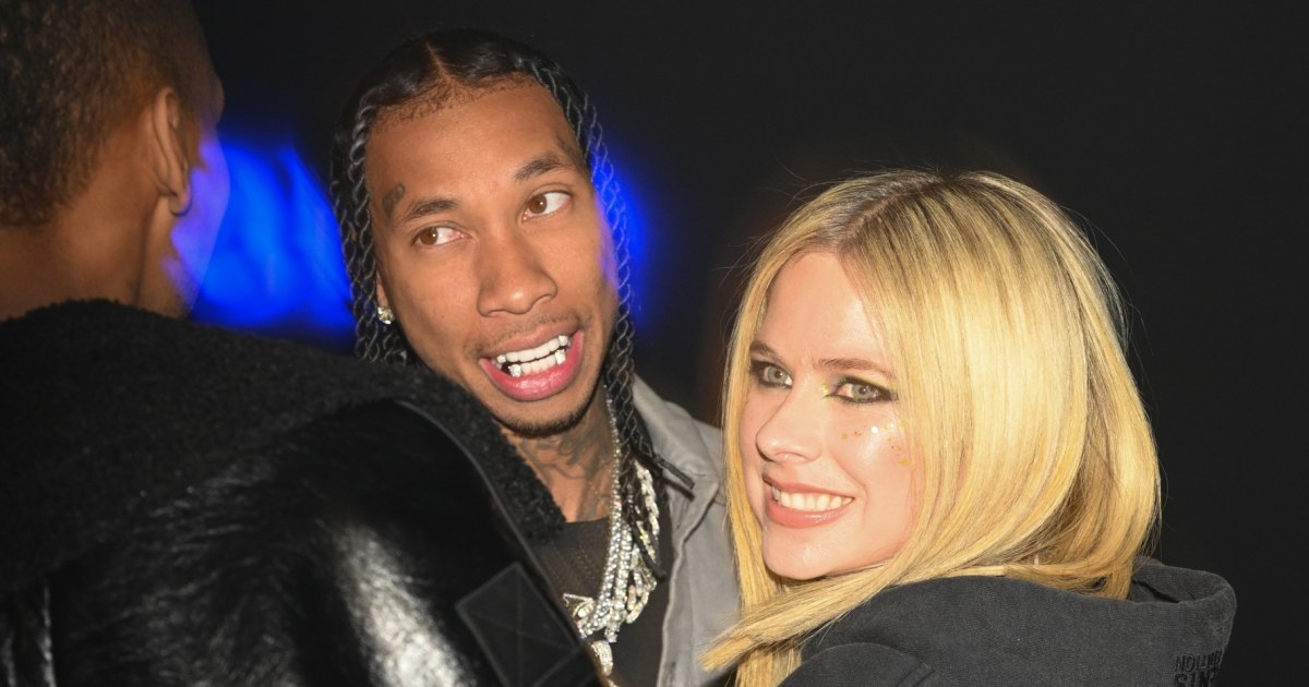 Avril Lavigne y Tyga confirman su romance en plena fiesta