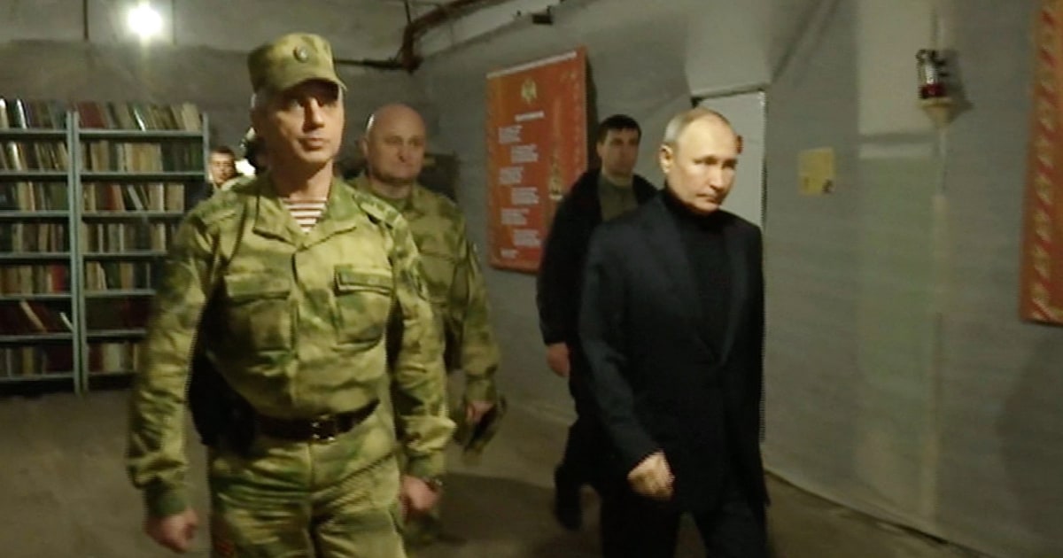 Putin rallies his troops with visit to occupied Ukraine